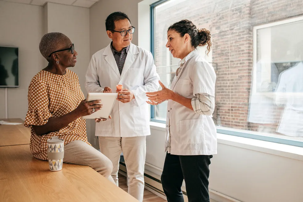 A woman consults with her doctor